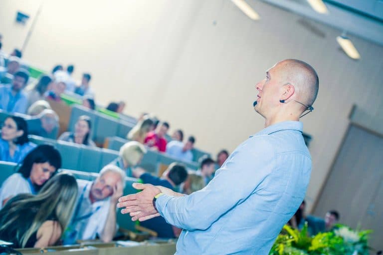 Egils speaking at an event